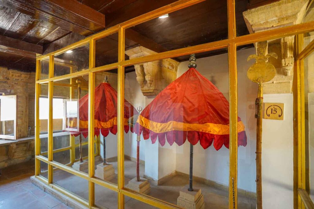 Red and yellow umbrellas in Maharaja Mahal inside Jaisalmer Fort. 