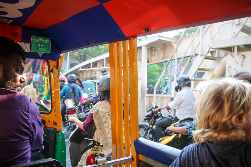 Getting around by rickshaw in India. 