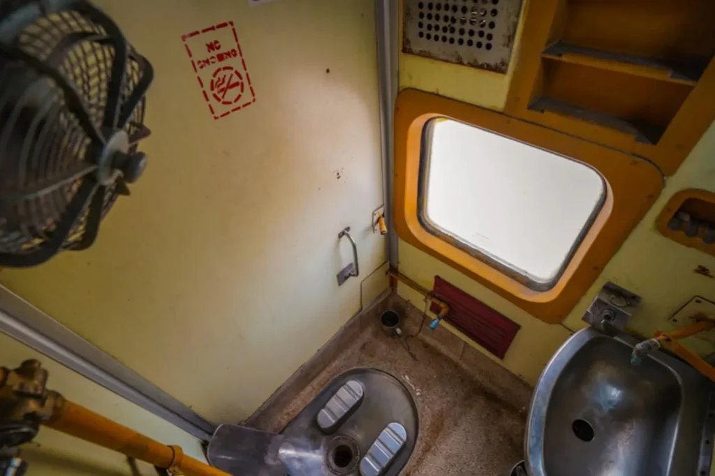 Squat toilet on the train in India. 