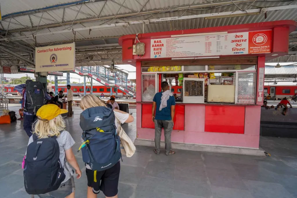 Buying snacks on the platform while waiting for our train in Bikaner to Jaipur. 