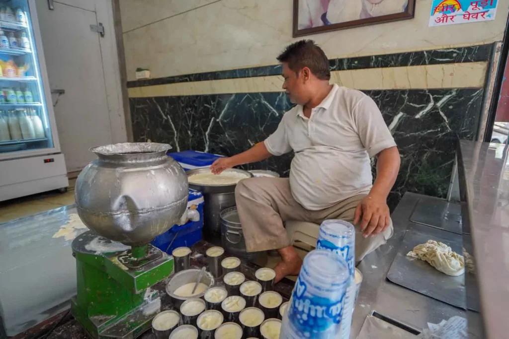 Creamy Amritsari Lassi being served up at the famous and decades old Ahuja Milk Bhandar.