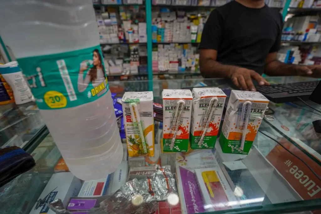Buying bottled drinking water and ORS Electrolyte drinks in Delhi.