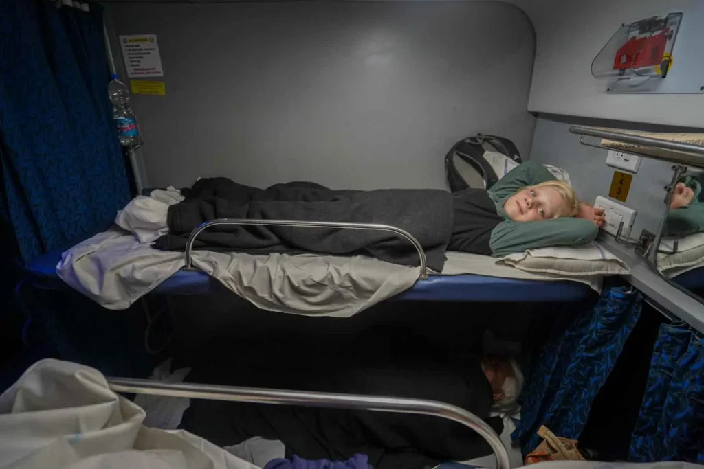Oscar and I took the top bunks this time with strangers in the bottom two and settled in for the night in 2A on the train Delhi to Udaipur.