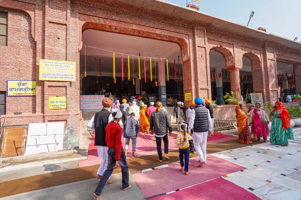 Entering into the Langar at the Golden Temple. 