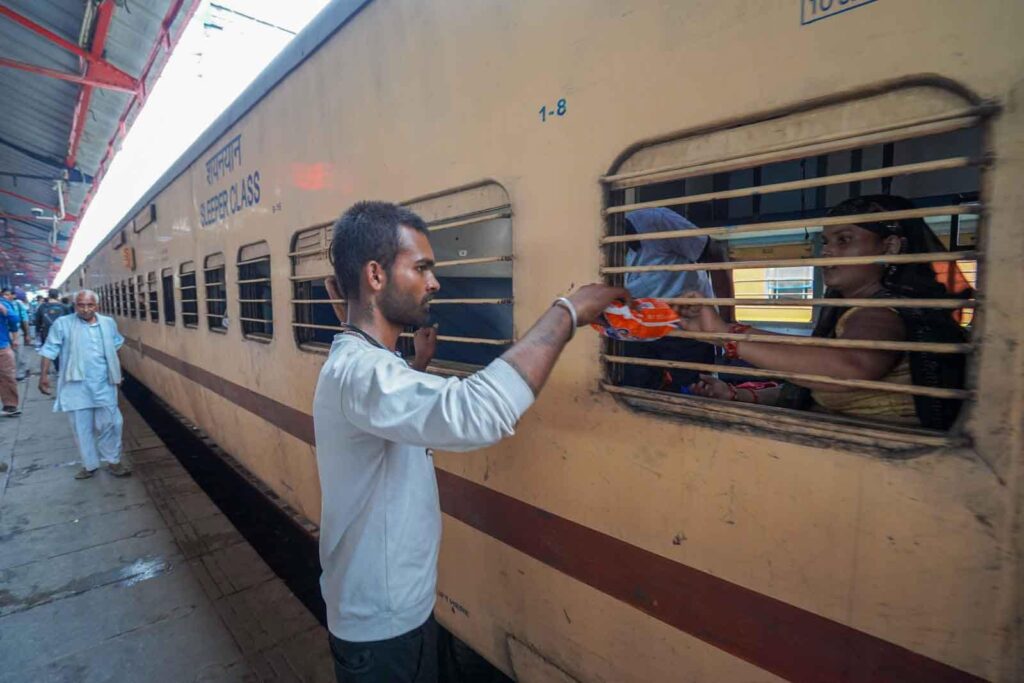 Travel in Sleeper Class on trains in India. 