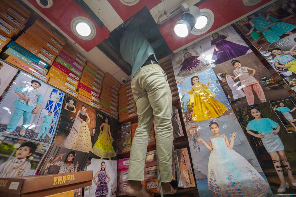Shopping for traditional clothes kids wear in India. 